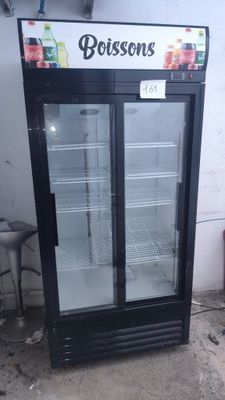 an image of a refrigerated refrigerator in a garage