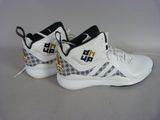 the shoe is white and has a black and gold logo on the side