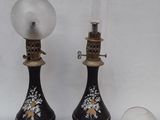 two lamps that are sitting next to each other on a table