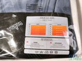 a picture of a package of men ' s clothing on a table