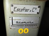 a close up of a parking meter with a yellow sticker on it