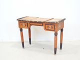 a small wooden table with two drawers on it