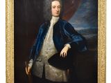 portrait d'un homme vêtu d'une veste bleue et d'une chemise blanche