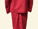 an image of a red suit on a mannequin stand