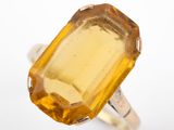an image of a ring with a large citrine stone in it