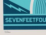 an image of a blue and white poster with the word seven feet four