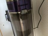 a vacuum that is attached to a wall