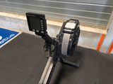 a small machine that is sitting on the ground