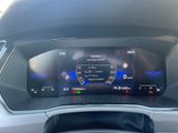 the dashboard of a car with a digital display in the center