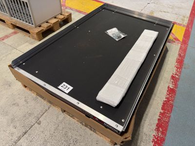a box with a remote control sitting on top of it