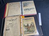 several old books sitting on top of a table next to each other