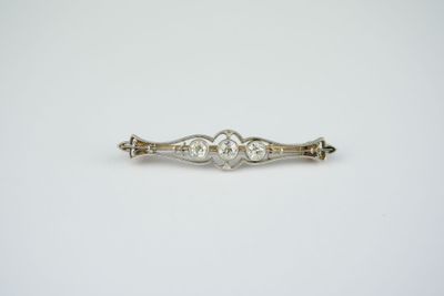 an antique silver and diamond broochle