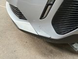 a close up of the front bumper of a car