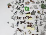 a lot of toy figurines that are on the table