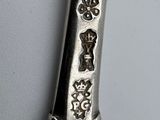 a close up of a pair of scissors on a table