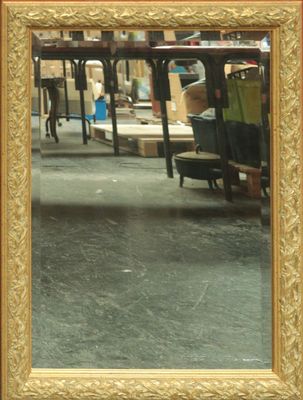 a picture of a mirror in the middle of a room