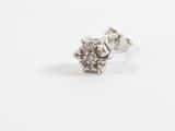 a close up of a pair of silver stud earrings on a white surface