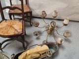 a lot of antiques on the floor of this room