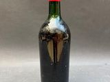 a bottle of wine that is sitting on a table