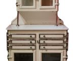 an image of a white kitchen cabinet with glass doors