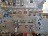 boxes of assorted items are on a table in a room