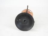 a small black object on a white surface