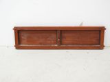 an image of a wooden shelf with two drawers on it
