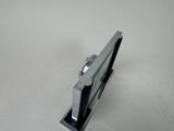 an image of a close up of a metal object on a table