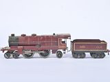 a toy train that is sitting on a white surface