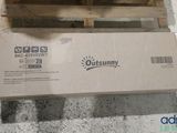a box that is sitting on the floor next to a pallet