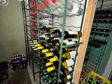 many bottles of wine on the shelves in the room