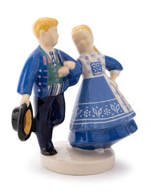 two figurines of a man and a woman dressed in blue