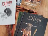 several children ' s books sitting on a table with a wooden table top