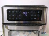 two ovens sitting on top of each other on a counter
