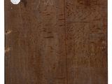 a wooden cabinet with a metal door and a window