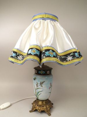 a lamp that is sitting on a table next to a mouse