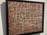 a picture of a painting on the wall hanging on the wall