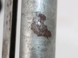 a close up of a metal object with writing on it