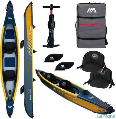 an inflatable kayak with paddles and accessories on a white background