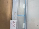 a metal cabinet with a sign on it in the corner of a room