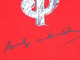 an image of a red book with a drawing of a dollar sign on it