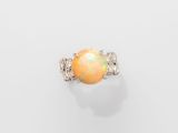 an oplite and diamond ring