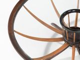 a glass table with a wooden base and a glass top