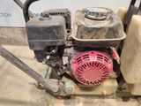 a small engine that is sitting on a pallet