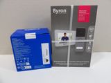 the box is open on the table next to the box of the device