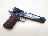 the gun is laying on the table ready to be used