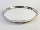 a silver plate with a handle and a handle on it