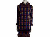 the mannequin is wearing a plaid dress with ruffled hems