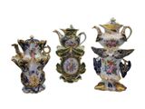 three vases with different designs on them on a white background