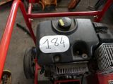 a picture of a lawn mower with a number plate on it